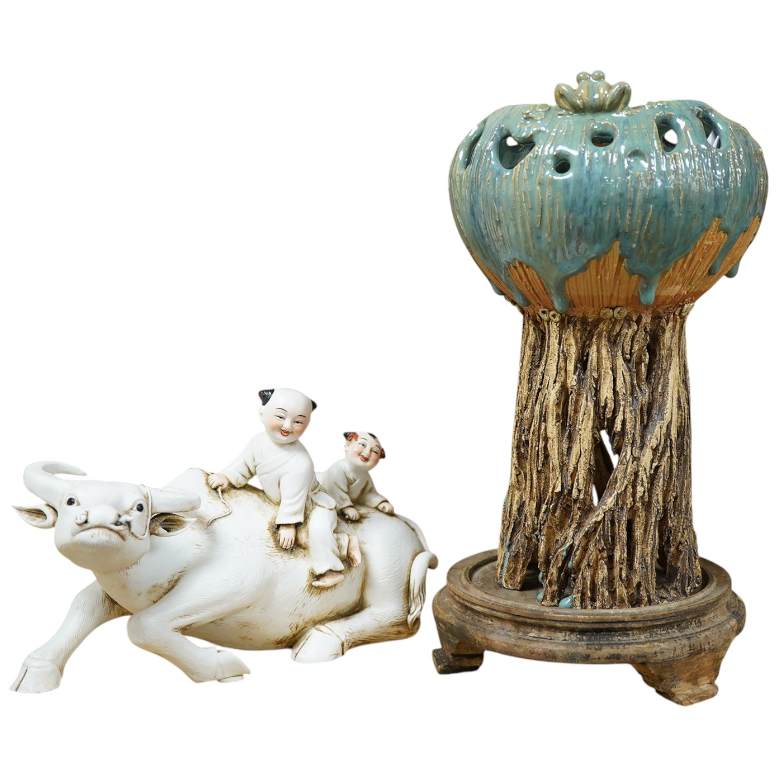 A Chinese Shiwan pottery pod shaped 'frog' vase - 32cm high including stand and a biscuit buffalo group (2)